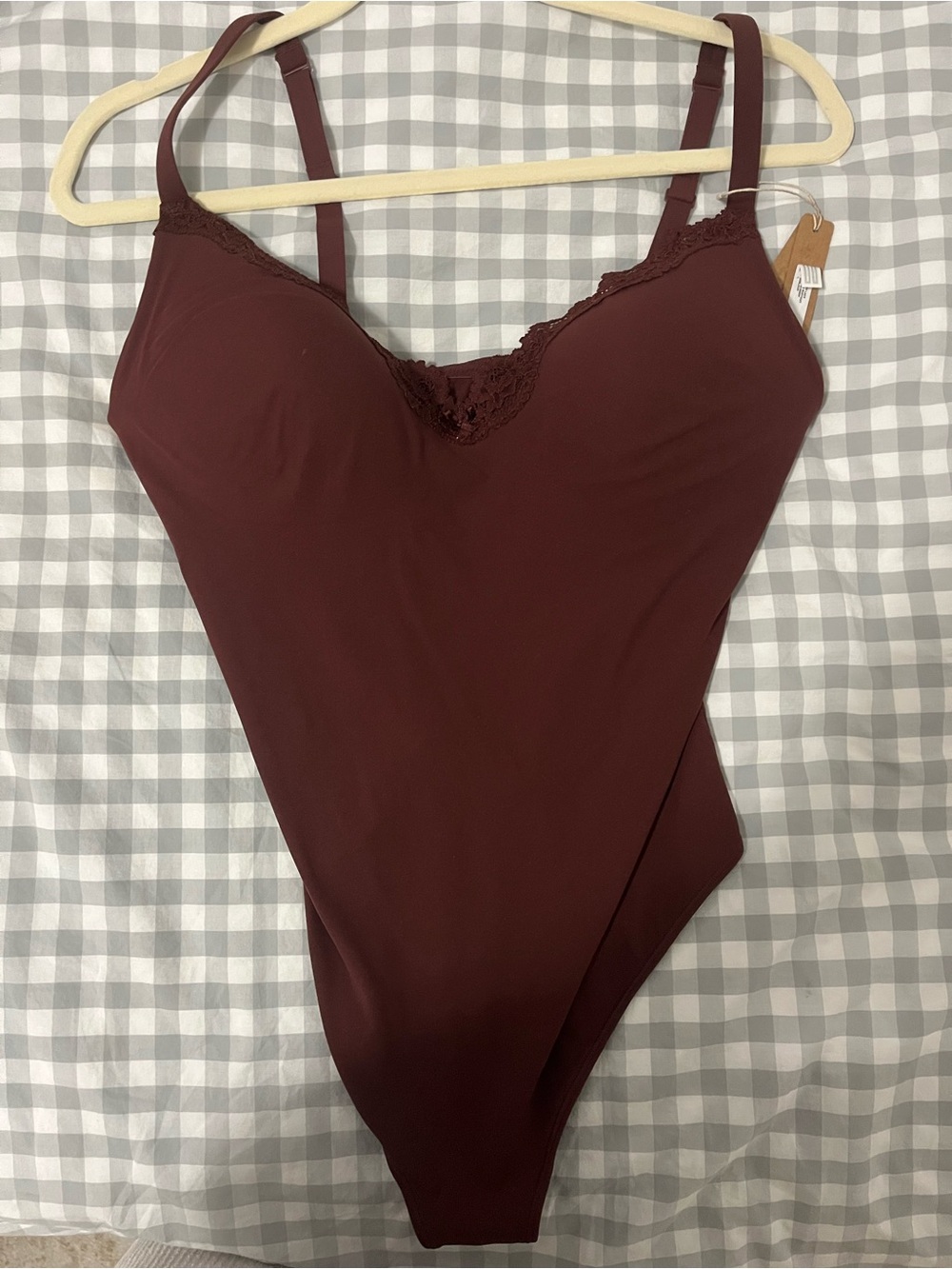 SKIMS Lace-Trim Bodysuit in Deep Wine